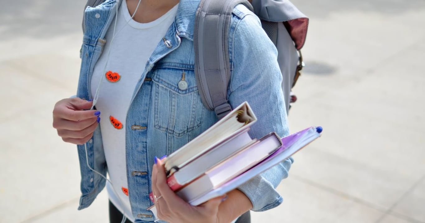 Woman holding books